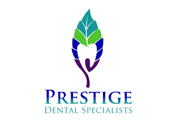 leaf and negative space tooth logo for dental office